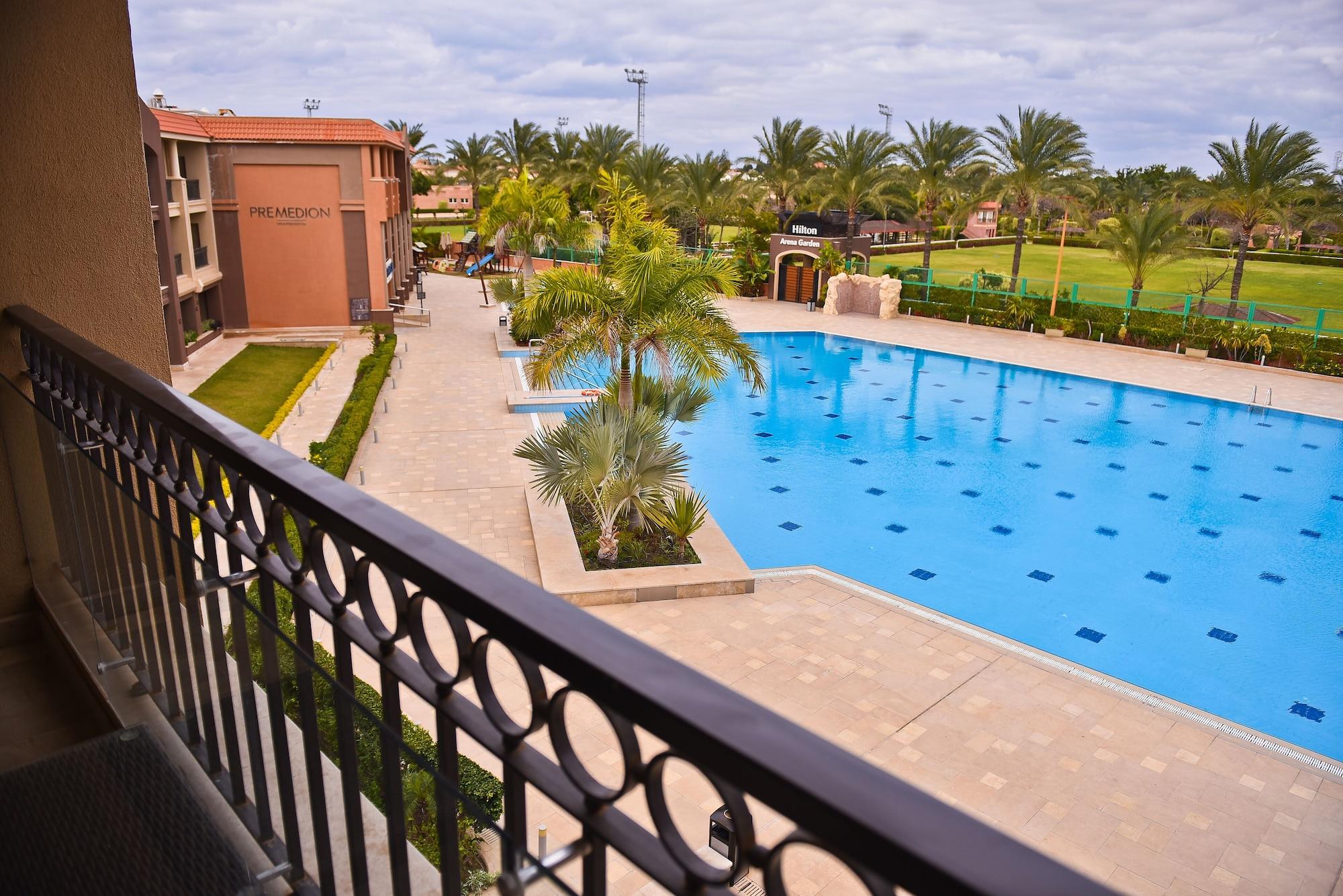 Hilton Alexandria King'S Ranch Hotel Кинг-Мариут Экстерьер фото View of the pool at the Palm Hills golf club